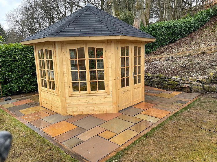 Coloured Slab Patio Installed for Summer House - Borders