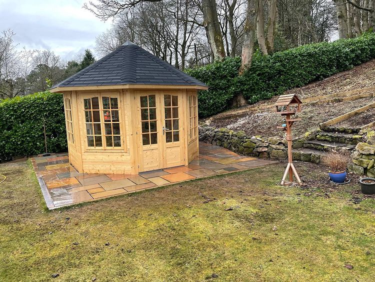 Coloured Slab Patio Installed for Summer House - Borders