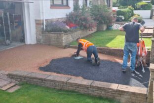 Our expert team excavated the area for the driveway and path and installed vuba resin.